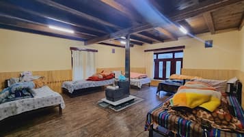 Basic Shared Dormitory | Premium bedding, Select Comfort beds, desk, laptop workspace