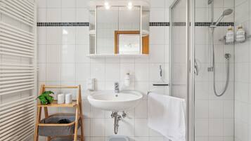 Hair dryer, towels, soap, shampoo