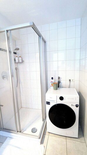 Hair dryer, towels, soap, shampoo