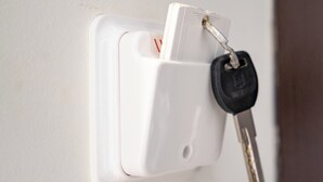 A wall-mounted electrical outlet with a keychain attached to it. - Cozy Studio at Vyronas for 2 pers by MPS (Vironas)