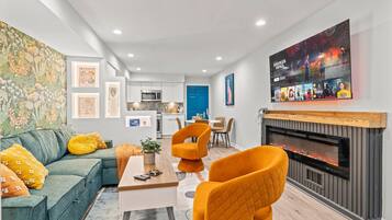 TV, lareira, videogames, livros