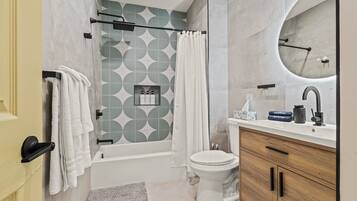 Hair dryer, towels, shampoo