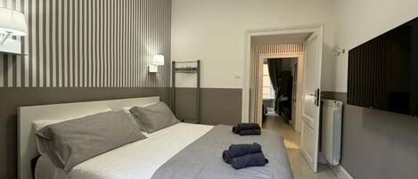 3 slaapkamers, een strijkplank/strijkijzer, gratis wifi, beddengoed