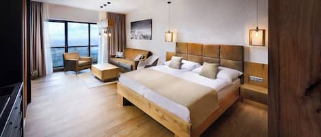 Deluxe Studio Suite, Valley View | Living area | Flat-screen TV, heated floors