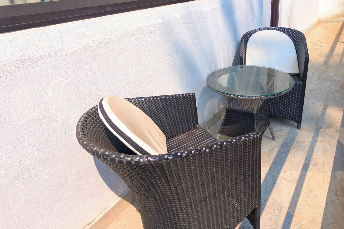Elite Double Room, 1 King Bed, Garden View | Terrace/patio