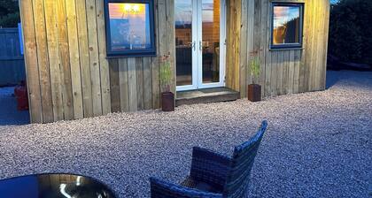 Glamping Pod in secluded location with Highland Cows at the fence