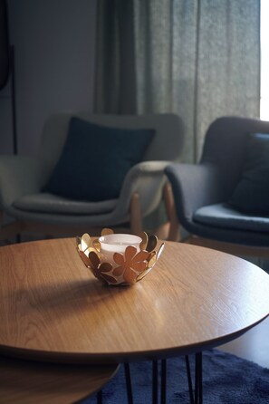 Design-Apartment, Balkon, Stadtblick | Wohnbereich