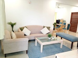 Two Bedroom Apartment | Living area | 44-inch LED TV with cable channels - Enkay Service Apartment (Hyderabad)
