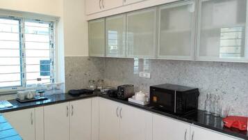 Two Bedroom Apartment | Private kitchen | Fridge, microwave, oven, electric kettle