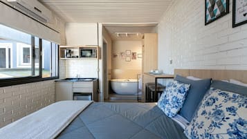 Apartamento | Wi-Fi de cortesia, roupa de cama