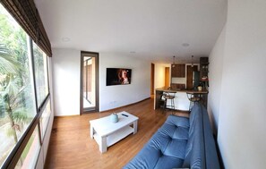 Junior Apartment, 1 Double Bed with Sofa bed, Balcony, City View | Living area | Flat-screen TV - Pie de Cerro Apartamentos (Medellín)
