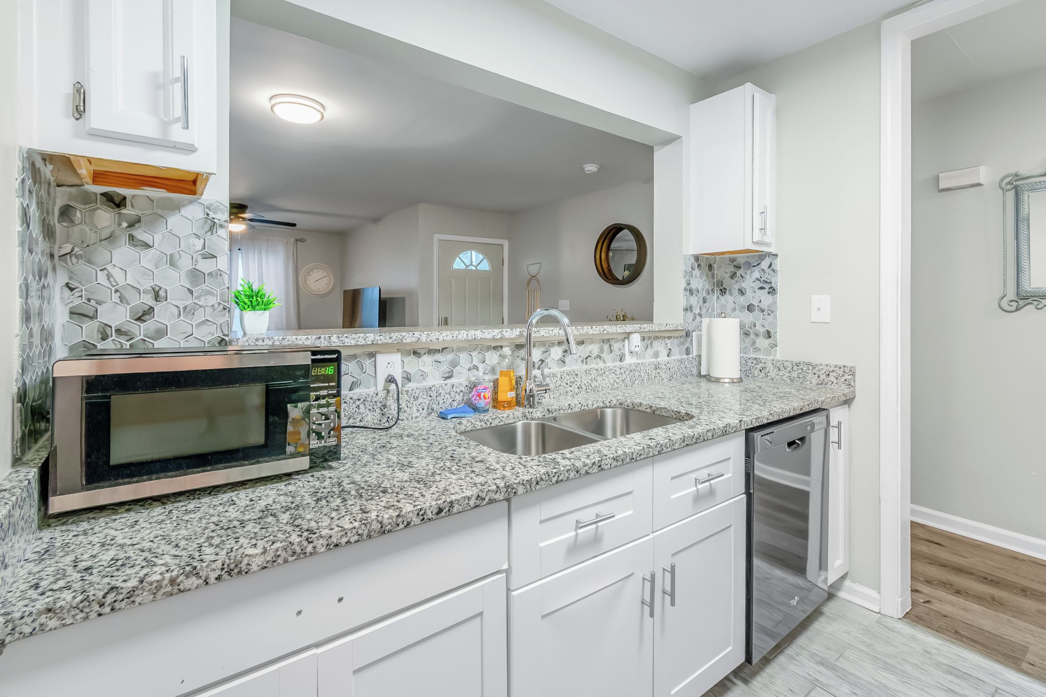 Fully equipped kitchen with stainless appliances and granite counters