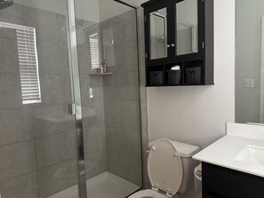Shower, towels, soap, shampoo