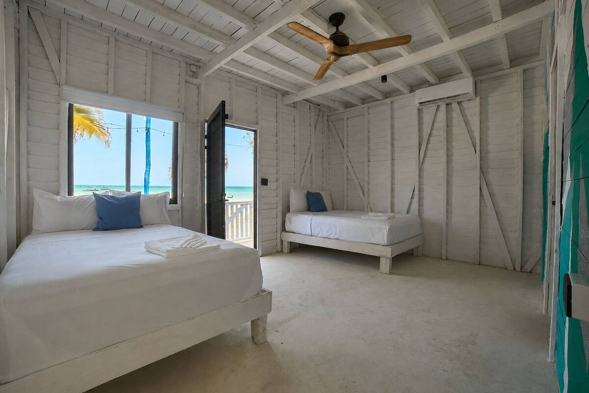 Deluxe Double Room, 2 Double Beds, Beachside | WiFi (free), bed sheets