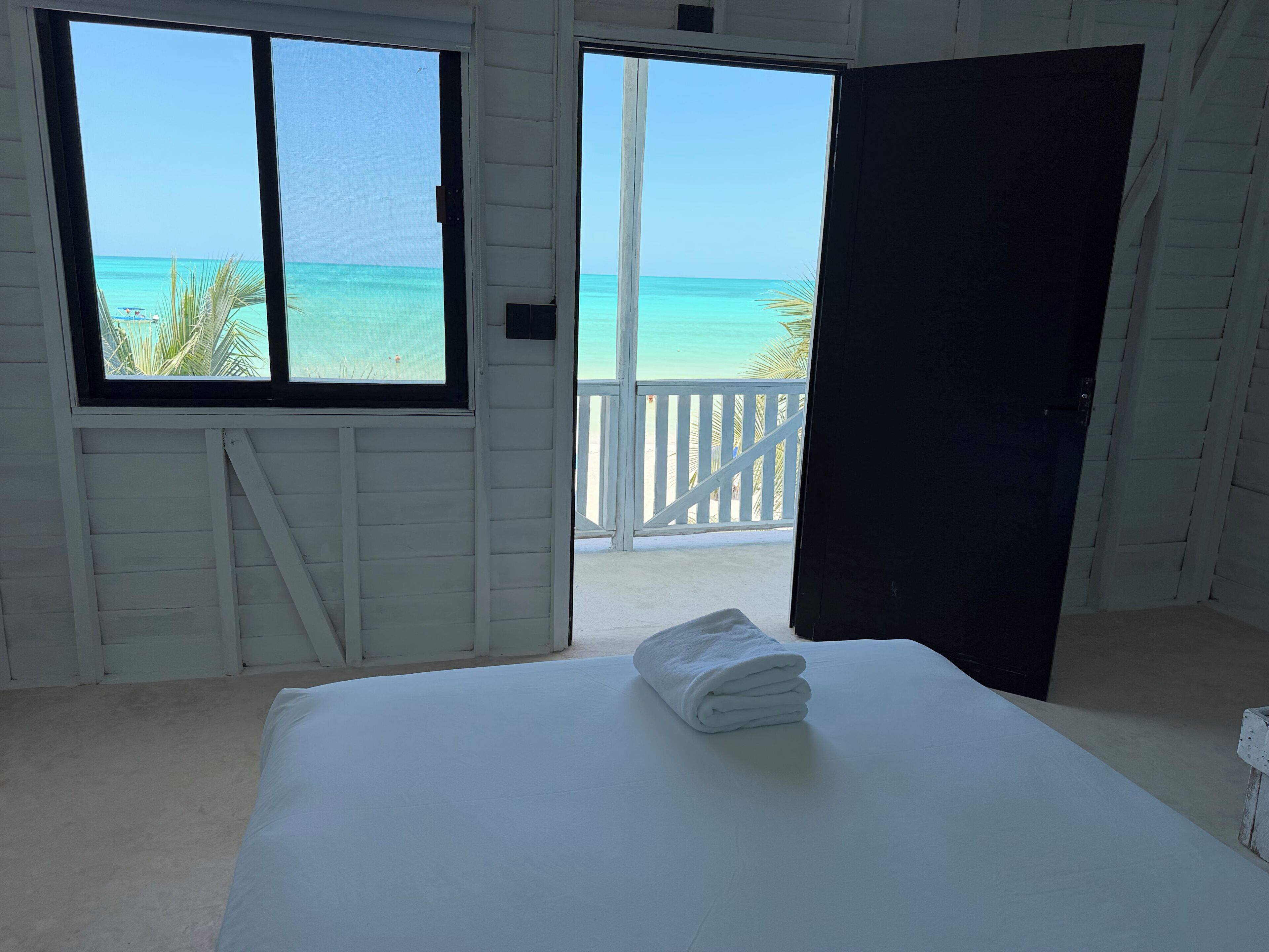 Deluxe Double Room, 2 Double Beds, Beach View | Free WiFi, bed sheets