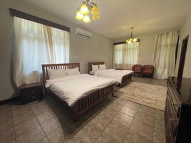 Family Room, Balcony, Garden View | Individually decorated, individually furnished, desk, laptop workspace