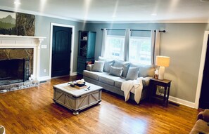 Smart TV, fireplace, books