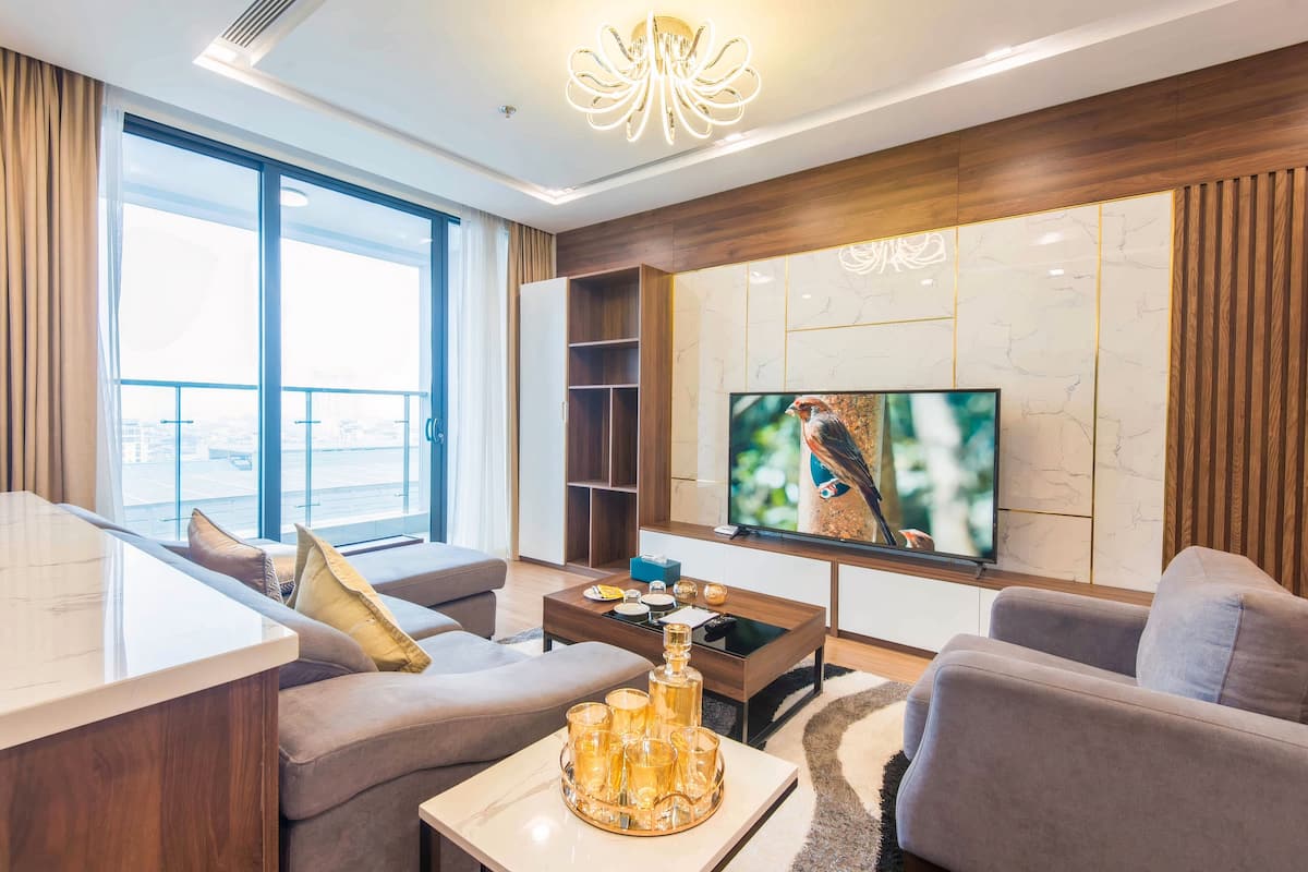 Premium Apartment | Living area | 45-inch LCD TV with satellite channels