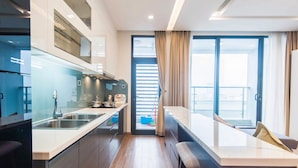 Premium Apartment | Private kitchen | Full-size fridge, microwave (on request), stovetop, rice cooker - Apartment with residence (Hanoi)