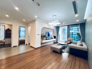 Appartement Luxe | Coin séjour | Télévision LCD de 45 pouces avec chaînes par satellite