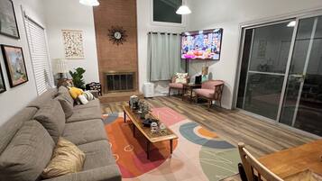 Smart TV, fireplace, books