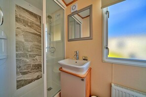 Shower, towels, toilet paper