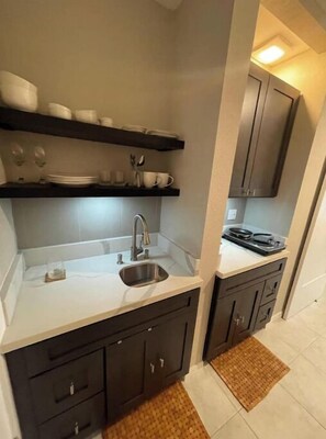 Fridge, microwave, coffee/tea maker, toaster