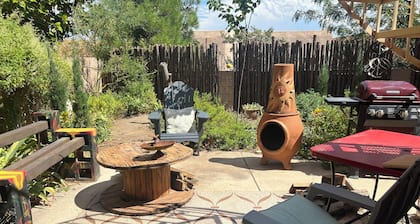 Stunning views of sunrises and hot air balloons. Zen garden & a hot tub await.