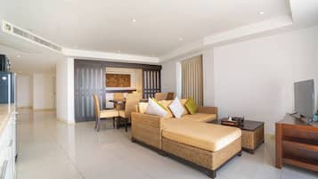 Exclusive Apartment, 2 Bedrooms, Balcony, Partial Ocean View | Living area | Flat-screen TV