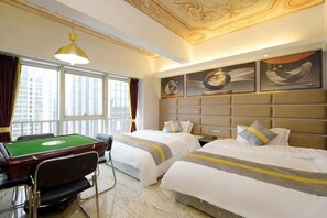 A hotel room with two beds, a pool table, and large windows. - Bandao Holiday Hotel (Changde)