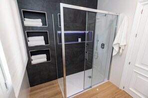 Shower, towels, soap, shampoo