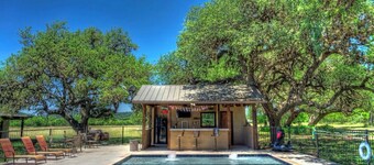  6-bedroom Lodge on 12 acres in Concan, Texas.  Swimming pool & hot tub.