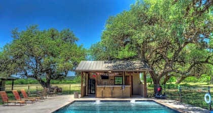 6-bedroom Lodge on 12 acres in Concan, Texas. Swimming pool & hot tub.