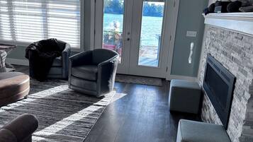 Smart TV, fireplace, books, printers