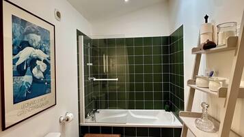 Shower, hair dryer, towels, toilet paper