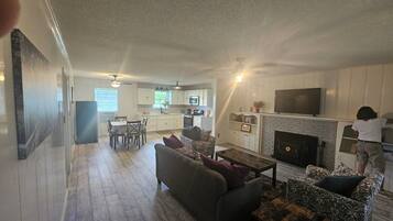 Smart TV, fireplace, books