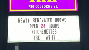 A neon sign for Brant Inn at 780 Colborne St. with details about newly renovated rooms, 24-hour kitchenettes, and free Wi-Fi. - Brant Inn (Brantford)