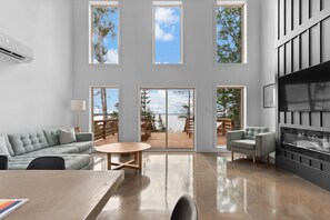 TV, fireplace - Oyster Creek Chalet 1 (Gaspereaux)