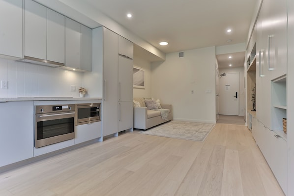 Basic Studio | Living area | 50-inch Smart TV with cable channels, Netflix, pay movies