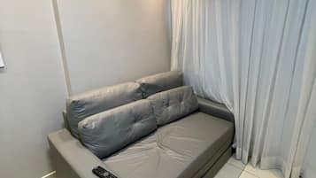 Apartamento conforto | Área de estar | TV de tela plana
