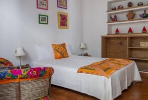 Deluxe Double Room, Courtyard View | Iron/ironing board, free WiFi