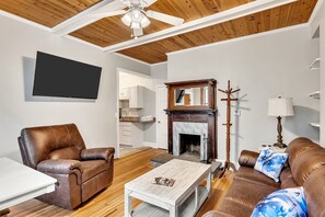 Smart TV, fireplace, books