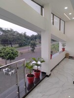 Habitación Deluxe doble, balcón, vistas al jardín | Terraza o patio