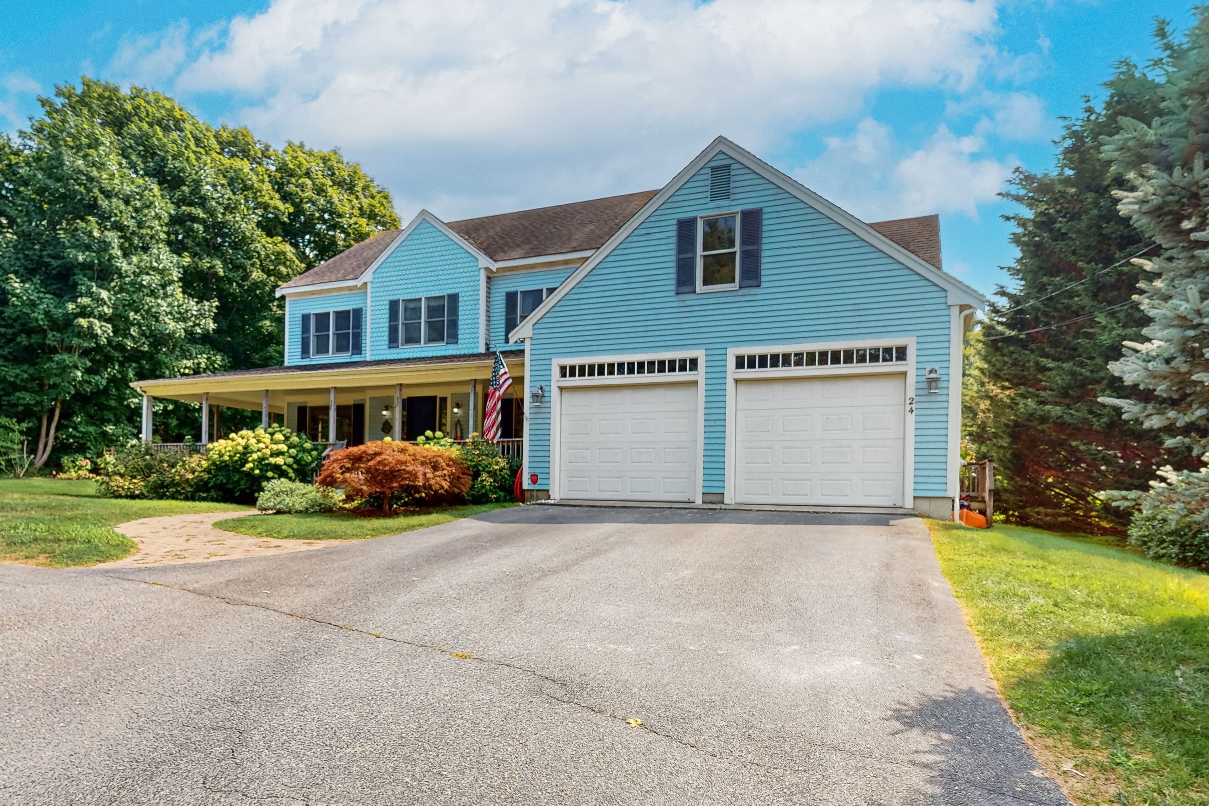 Spacious home in a central location with W/D, AC, porch, & grill