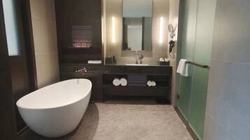 Separate tub and shower, hair dryer, towels, soap