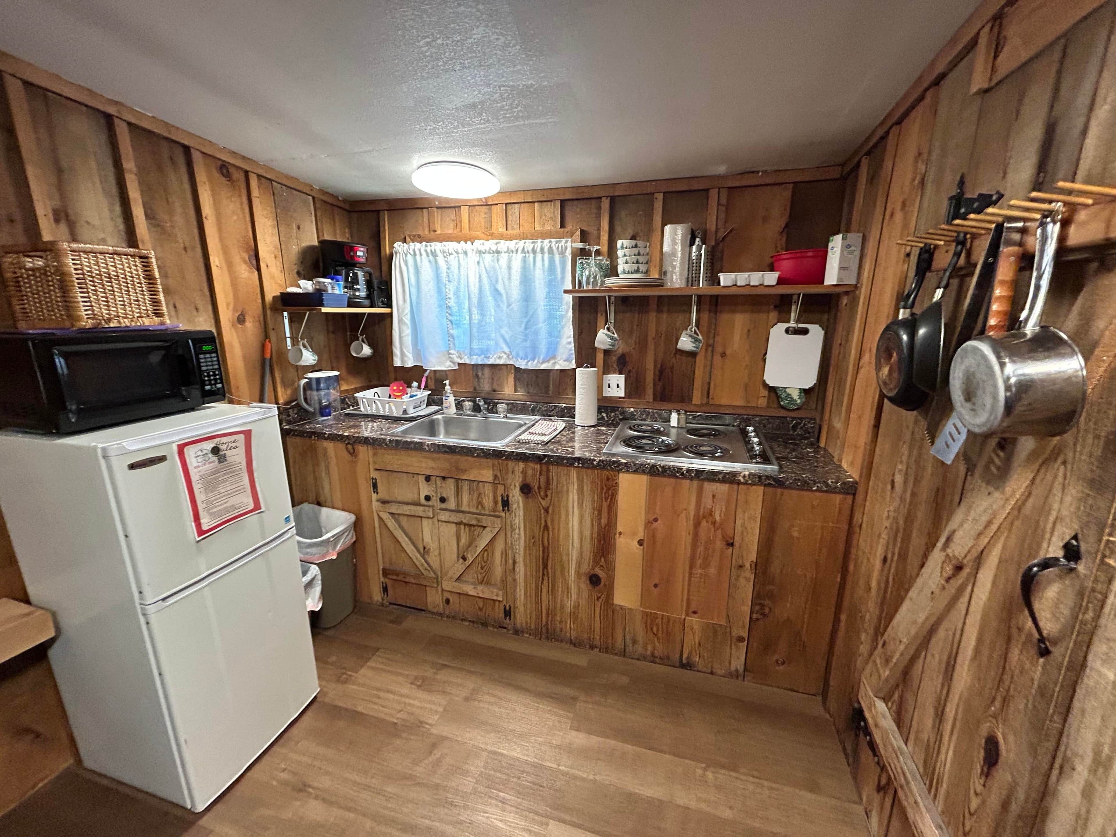 Fridge, microwave, stovetop, coffee/tea maker