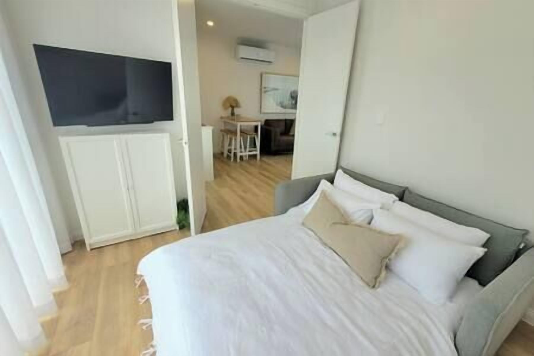 2 dormitorios, tabla de planchar con plancha, wifi gratis y ropa de cama