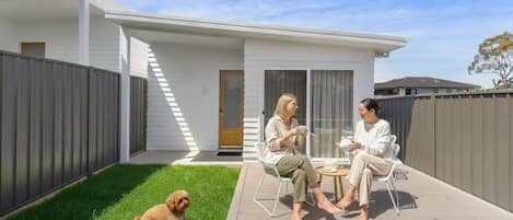 Sunny deck and enclosed yard for your dog
