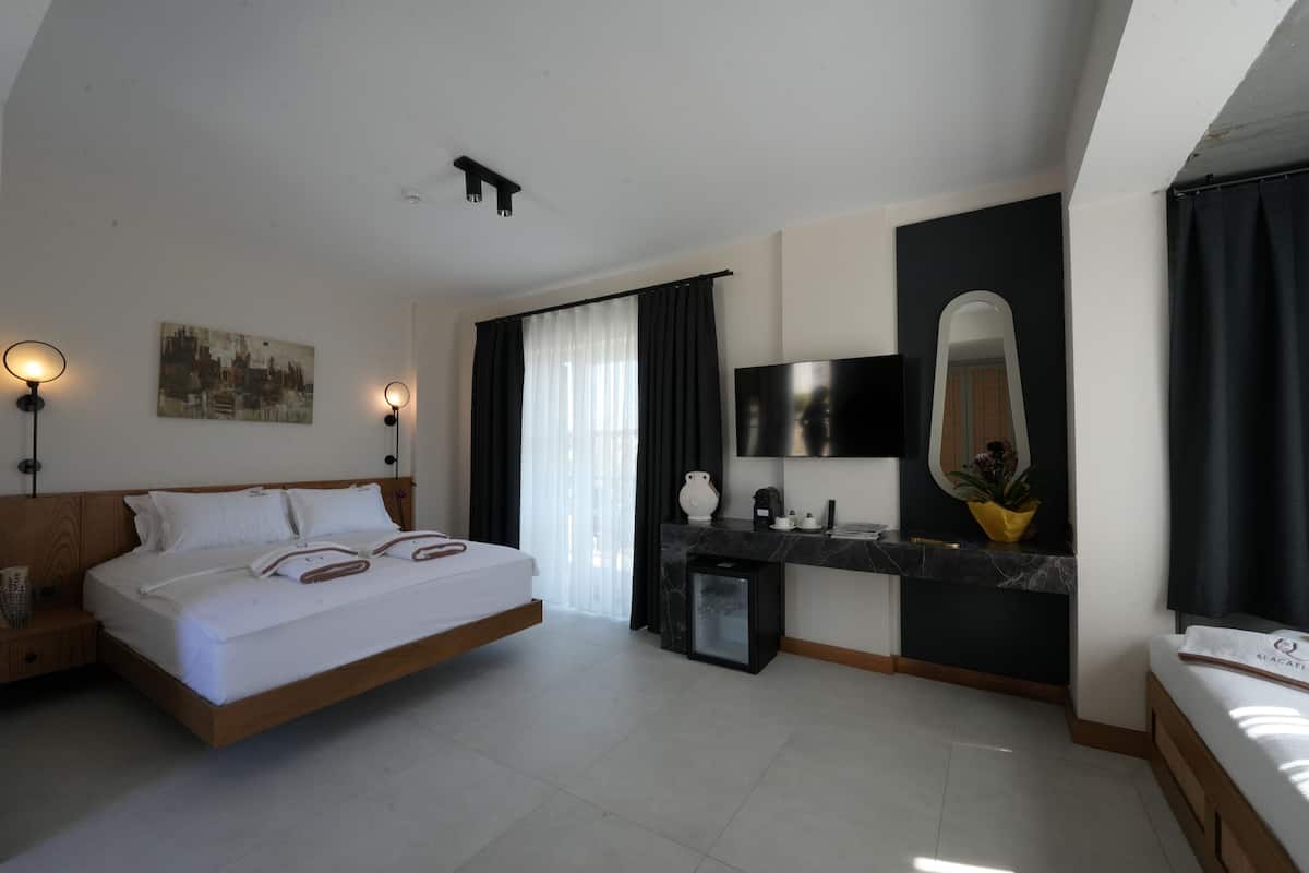 Family Room, Balcony, Pool View | In-room safe, blackout drapes, soundproofing, free WiFi