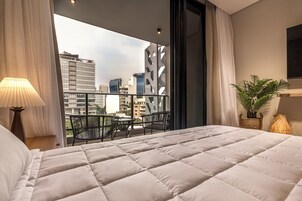 Studio | Laptop workspace, blackout drapes, soundproofing, iron/ironing board